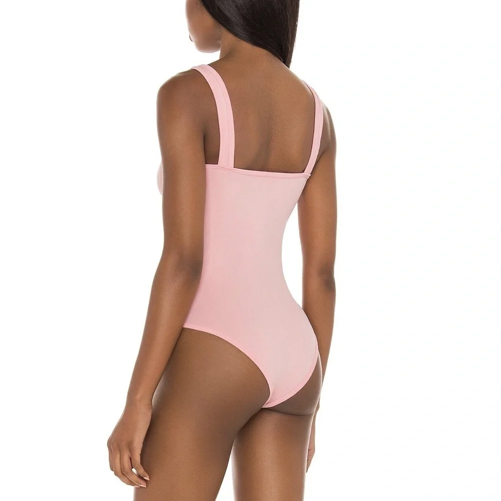 NWT Free People Washed Seamless Bodysuit in Washed Pink